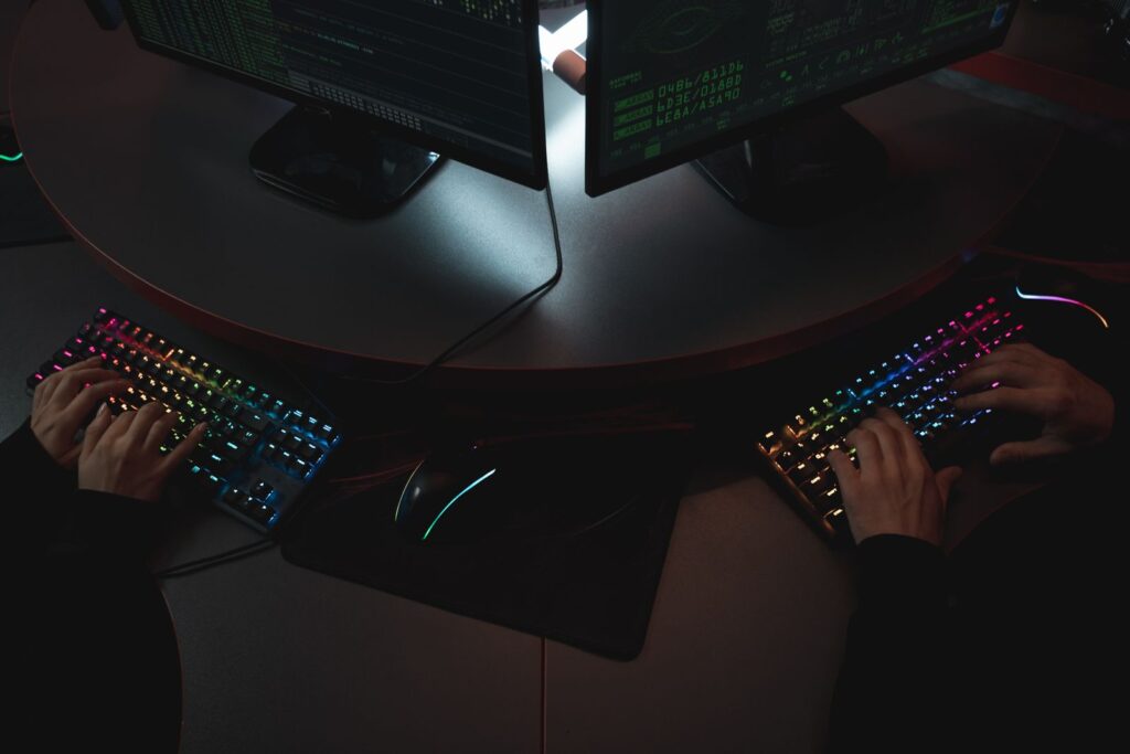Cybersecurity analyst at screens