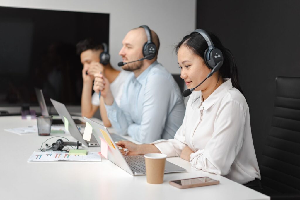 IT service desk team with headsets